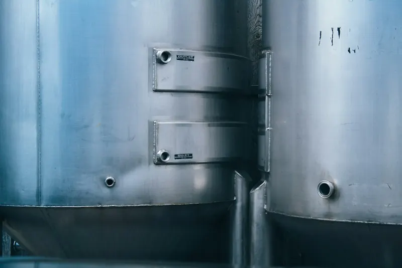 Stainless steel process tanks with inlet and outlet ports