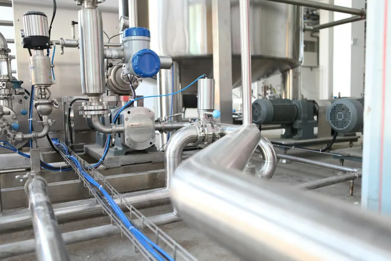 Stainless pump skid with sanitary piping
